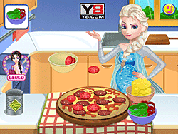 Elsa embarazada cocinando pizza