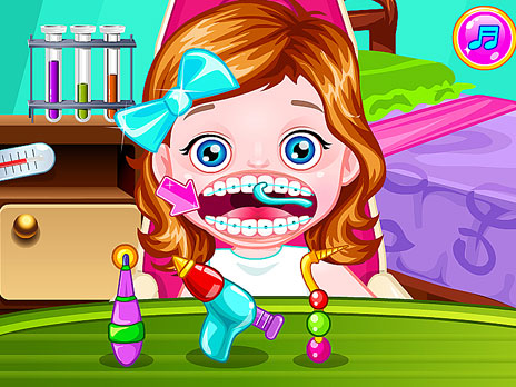 Dottore in apparecchi ortodontici per bambini