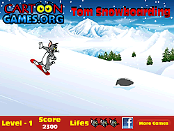 Tom fait du snowboard